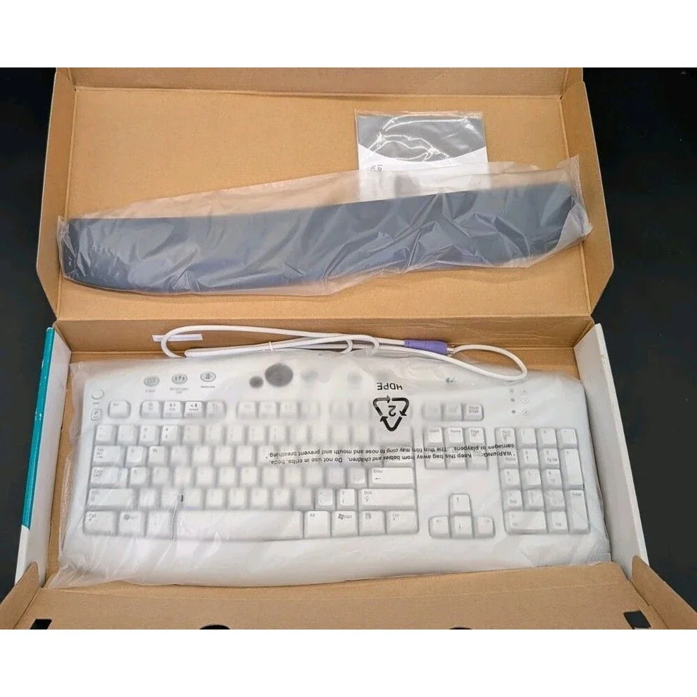 Logitech Access Wired PS/2 PC Keyboard Wired Ergonomic Open NEW